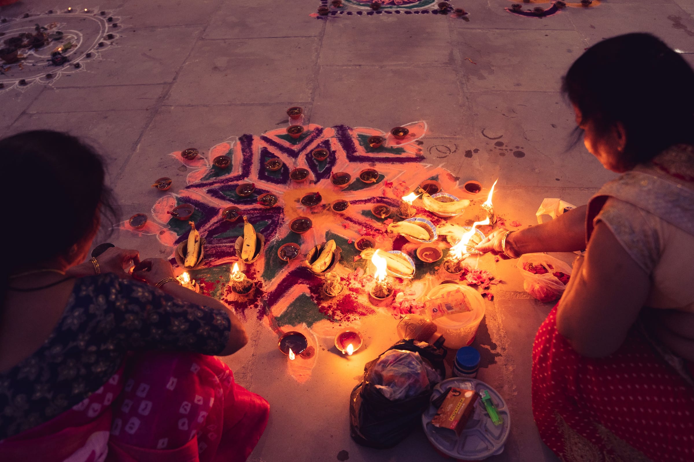 Diwali lamps lit along a riverside ghat