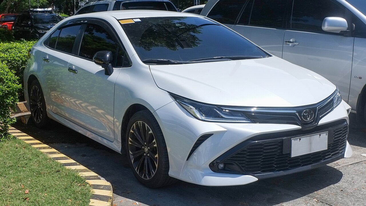White sedan for city and airport transfers