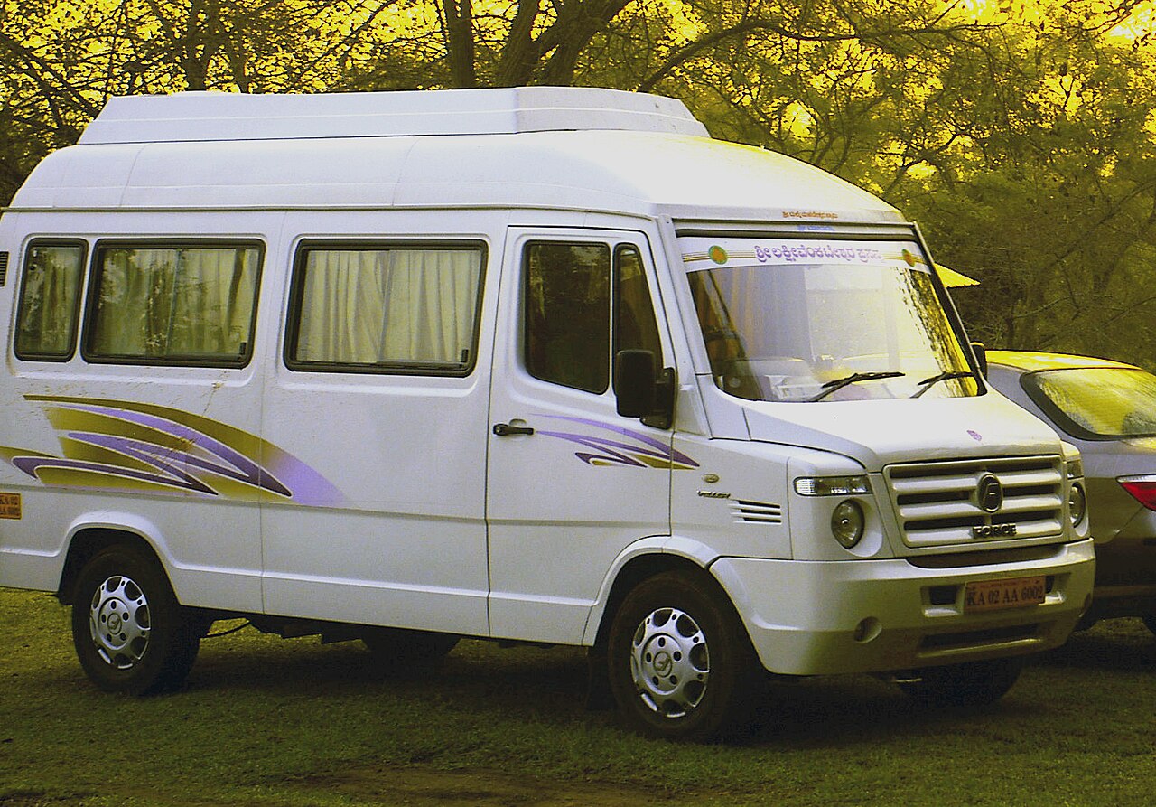 White Tempo Traveller for large group travel