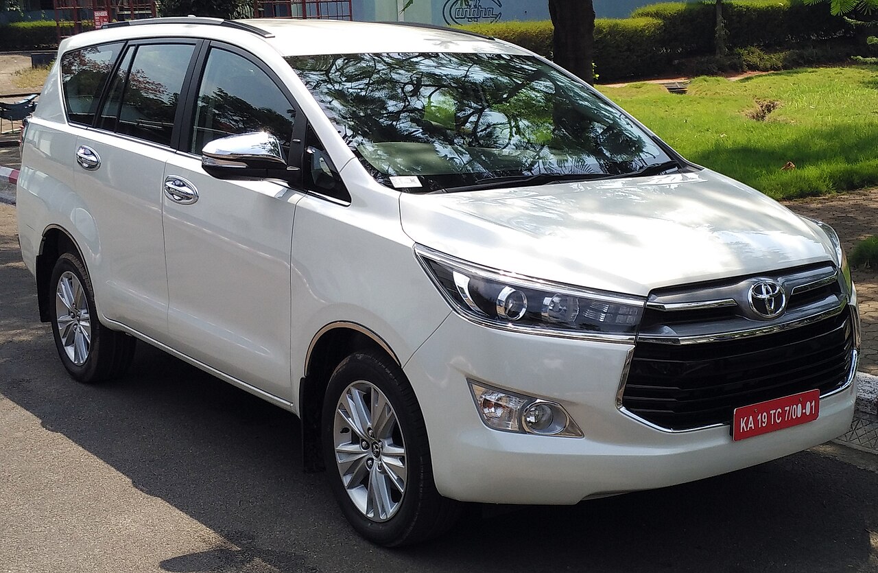 White MPV van for family and small group travel